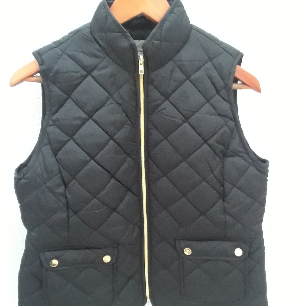 Quilted, fully lined black vest